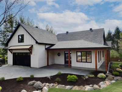 facade-maison-unifamiliale-sur-dalle-style-farmhouse-avec-garage-Habitations-CHL-2024