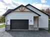 Vue-cote-Baril-Porte-garage-Maison-modele-2024-Constructions-Andre-Jacques-Warwick