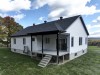 Vue-arriere-patio-beton-couvert-Maison-modele-2024-Constructions-Andre-Jacques-Warwick